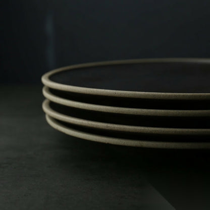 Assiette en grès émaillé noir « Clématite »