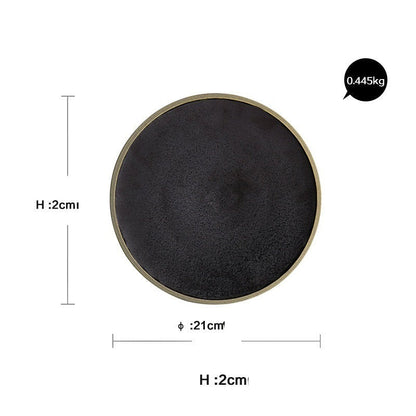 Assiette en grès émaillé noir « Clématite »